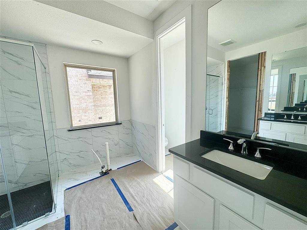 Separate vanities make getting ready for the day a breeze!