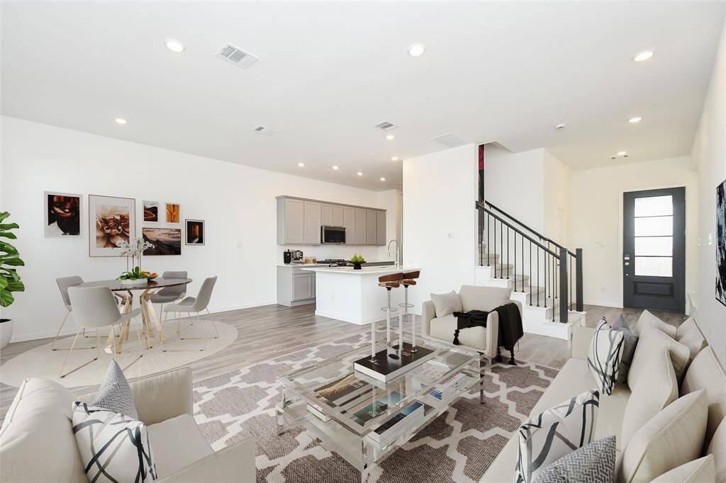 Another view of the open concept floor plan. Virtually staged photo