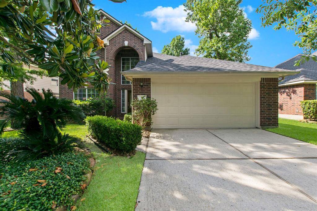 This two-story home has a 2-car garage and double driveway.