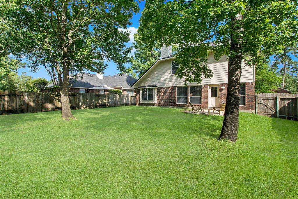 The spacious backyard is perfect for play and recreation.