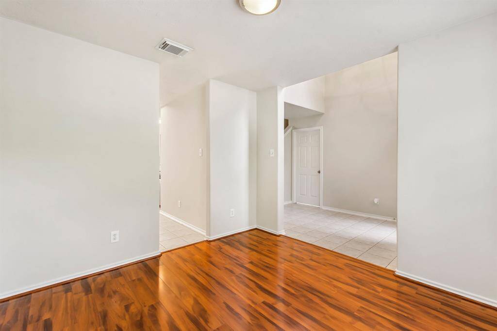 An alternate view of the dining room located off of the main entry.