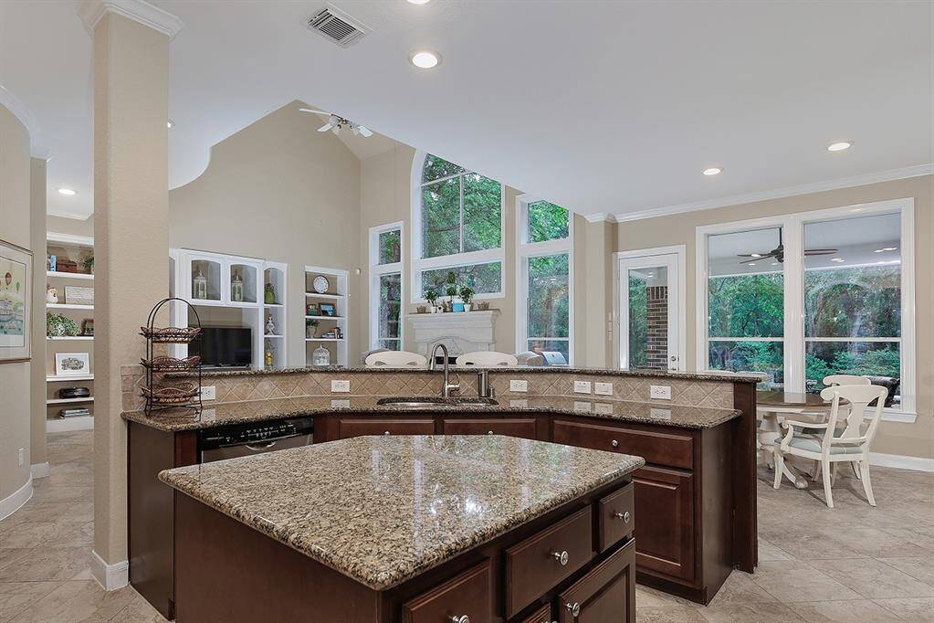 View of the family room from the kitchen such a great layout for families.