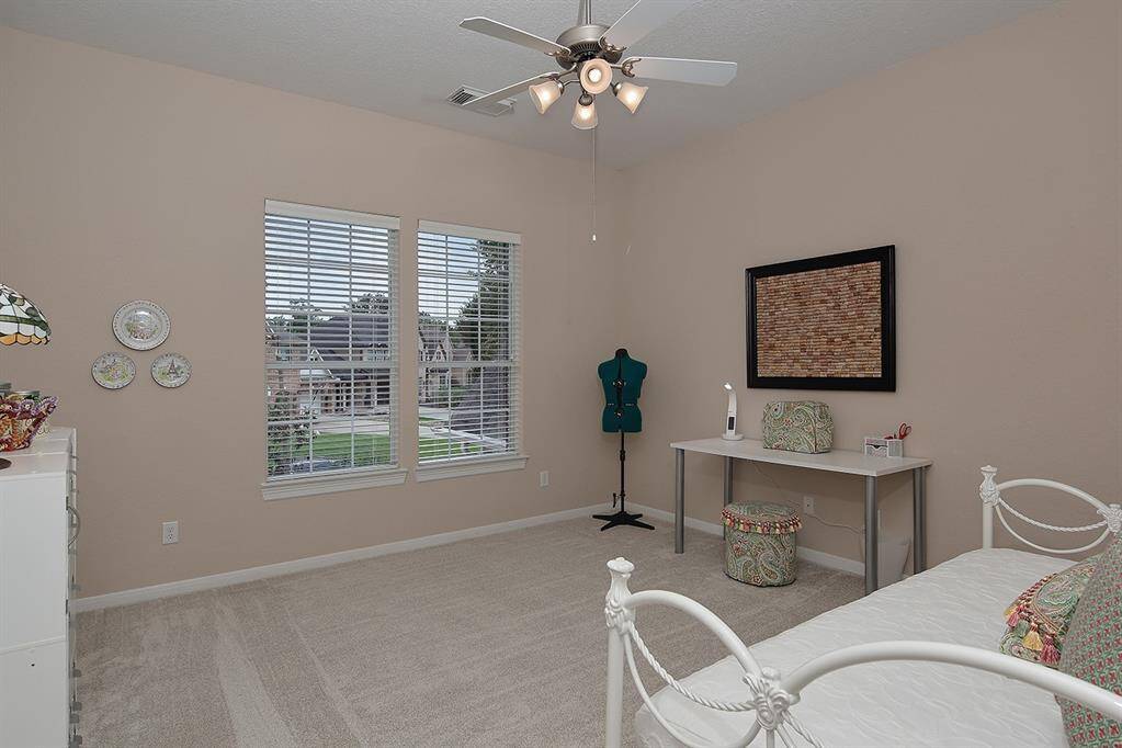 Bedroom two is spacious and private.