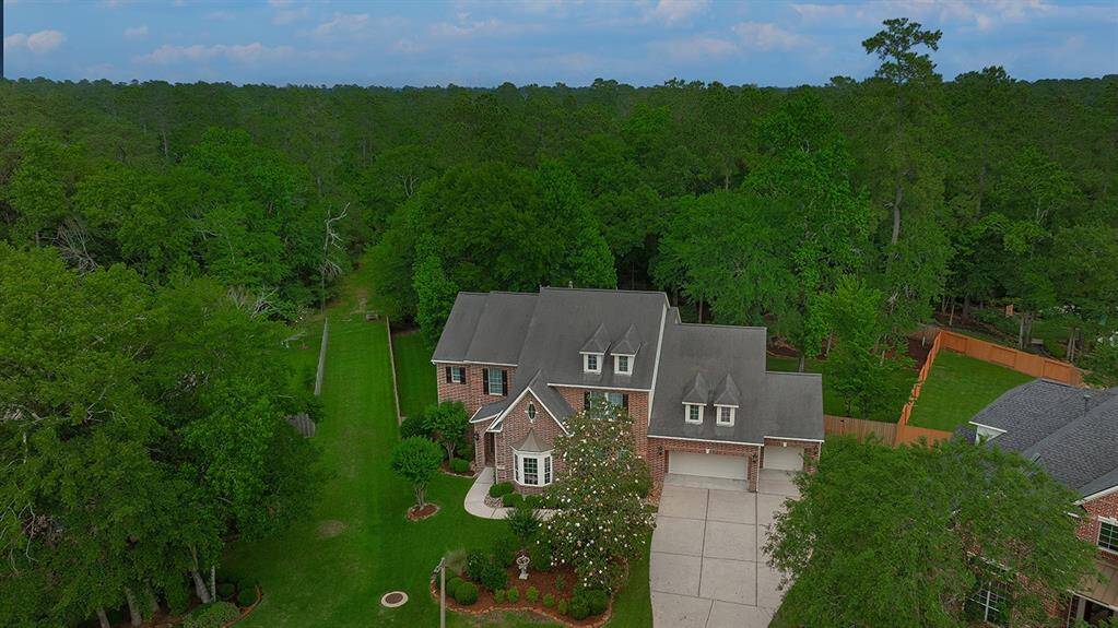 Aerial view of the woods behind the property.