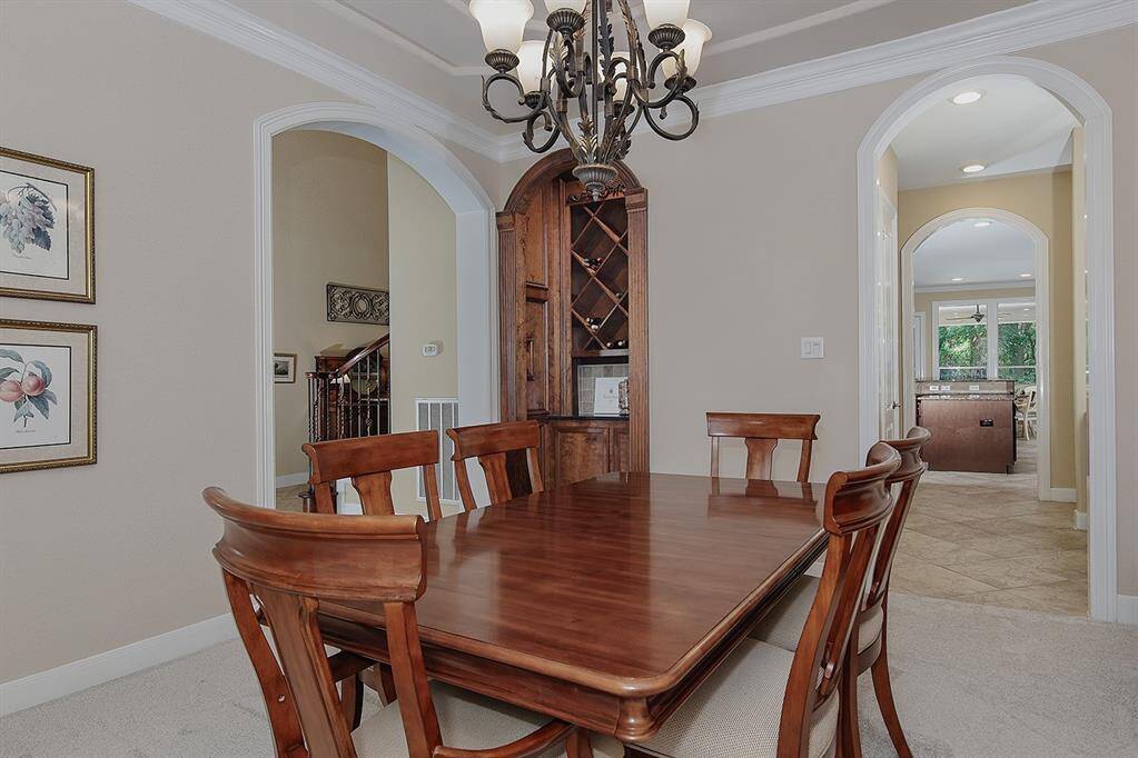 View of the custom wine grotto in dining area.