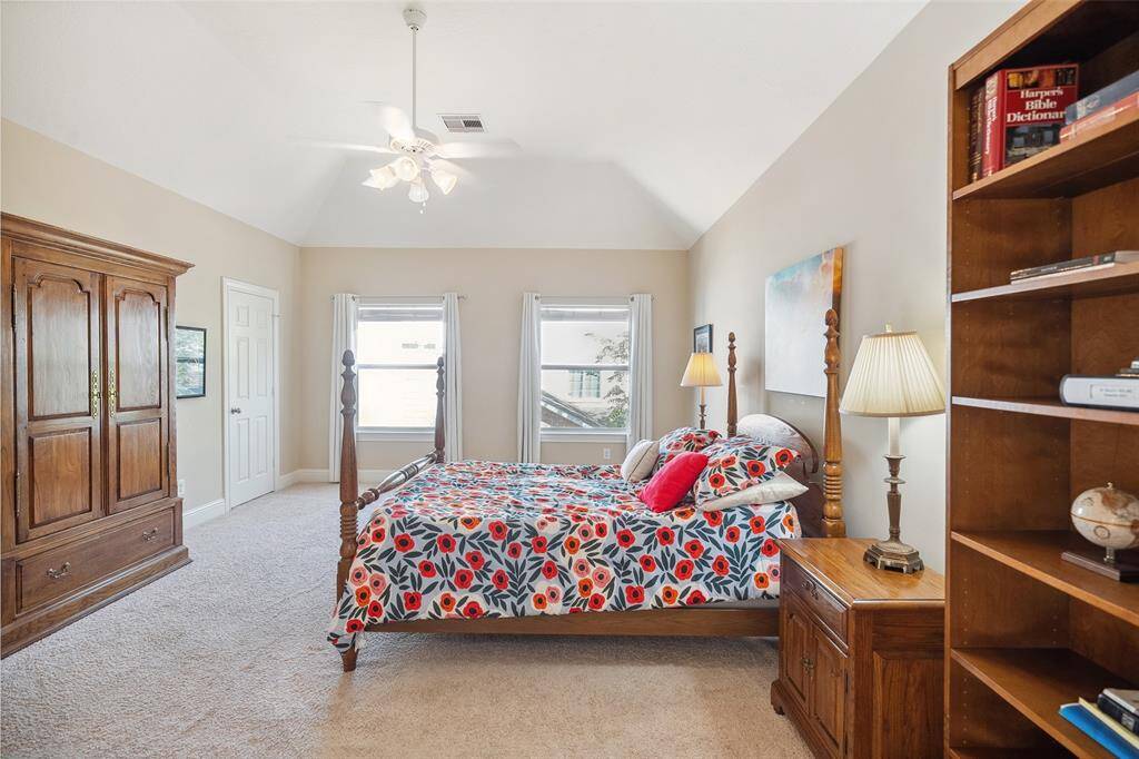 The primary bedroom is quite spacious with plenty of room for a King size bedroom set and a sitting area.