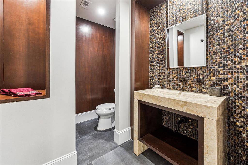 The powder bathroom is conveniently located on the first floor. It's perfect for guests.