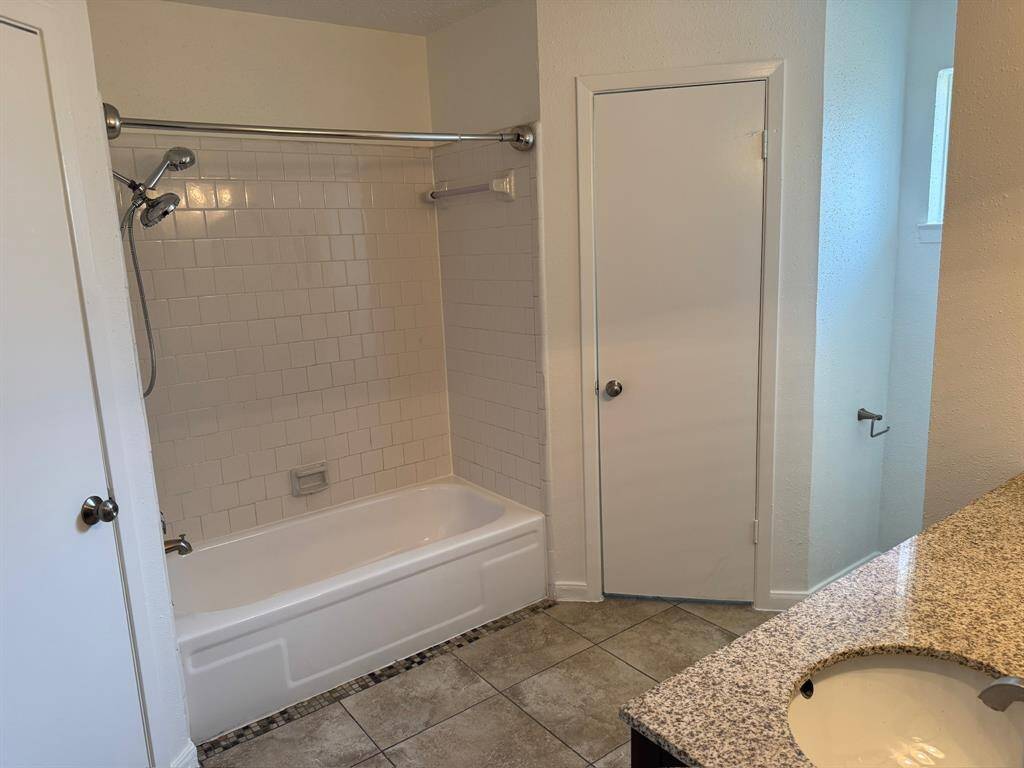 Primary Bath with his/hers closets
