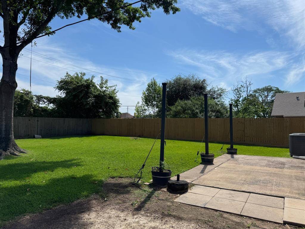 Park-like Backyard with open space behind.