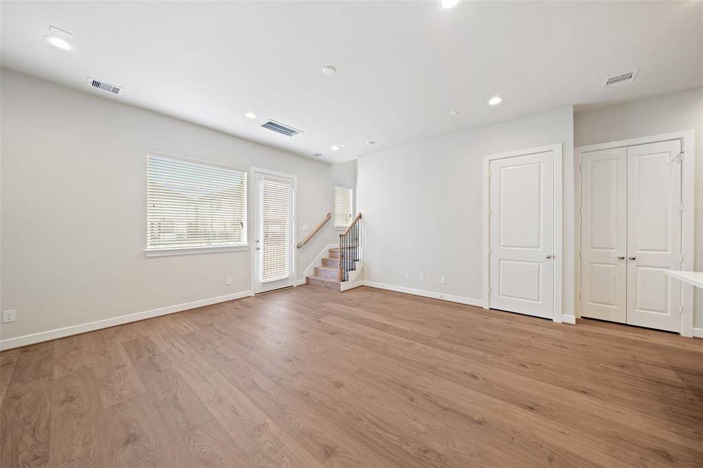 Tons of storage in this unit.  Under stair closet and large pantry. Light and bright room with ample room for entertaining.