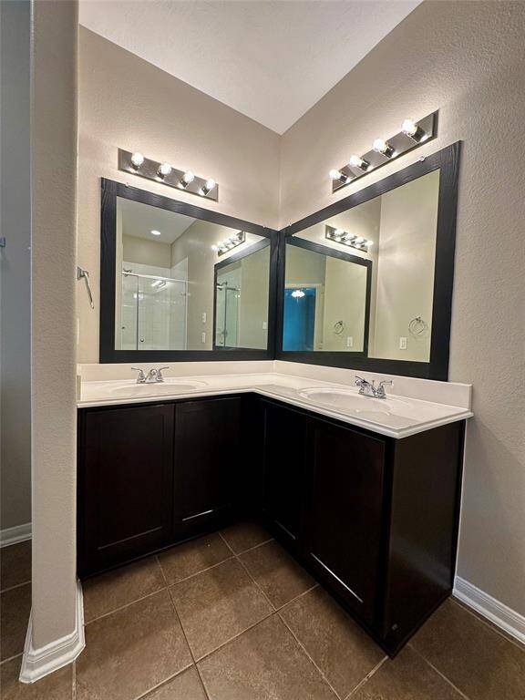 Double vanity master ensuite with walk in shower.