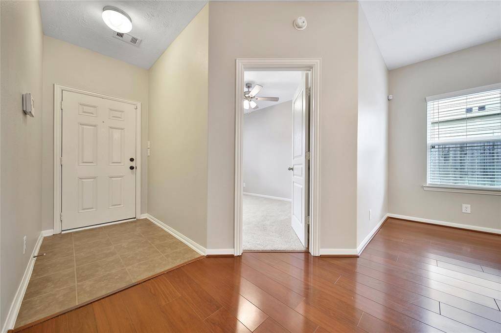 Front foyer and guest bedroom.