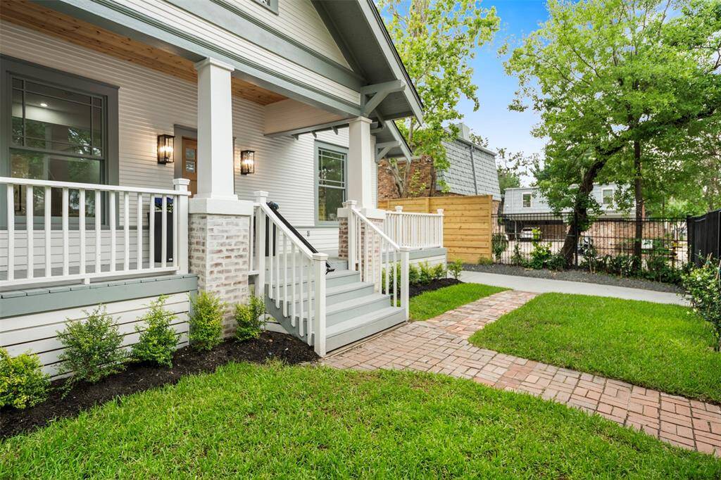 Original brick and wood utilized in renovation to maintain the home's historic charm