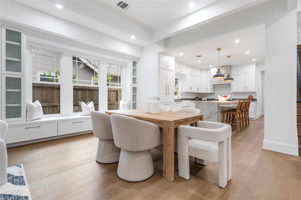 Dining Area with built in storage, cabinetry, an bench