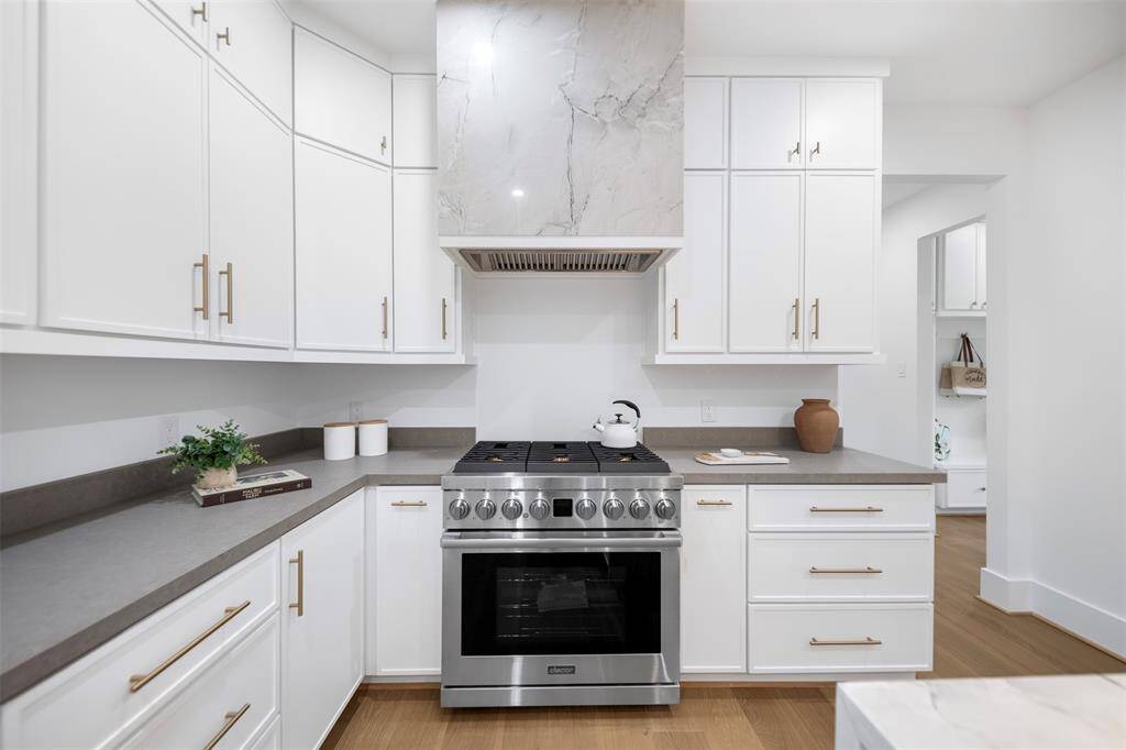 Plenty of kitchen storage with custom slim shaker cabinets
