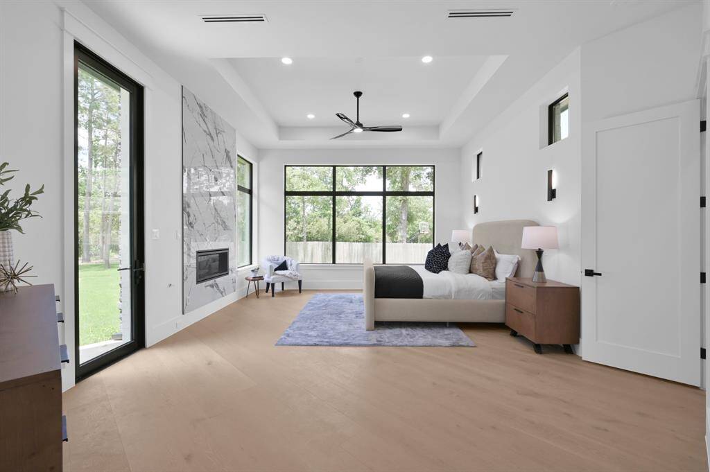Nice, large primary bedroom with a fireplace