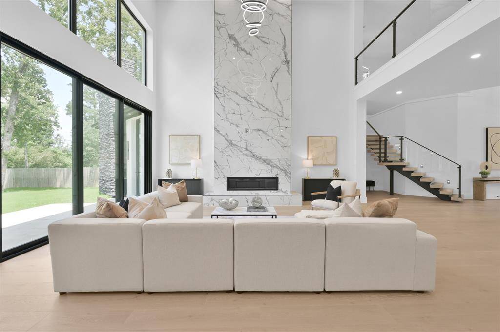 Floor to ceiling statement fireplace