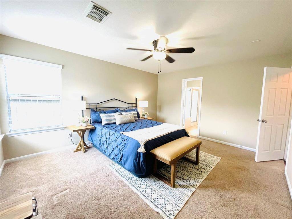 Another view of the primarybedroom.