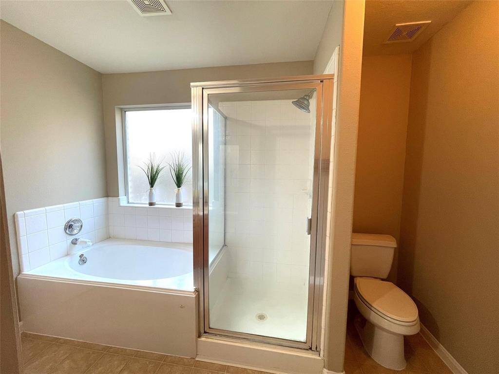 Separate tub and shower.