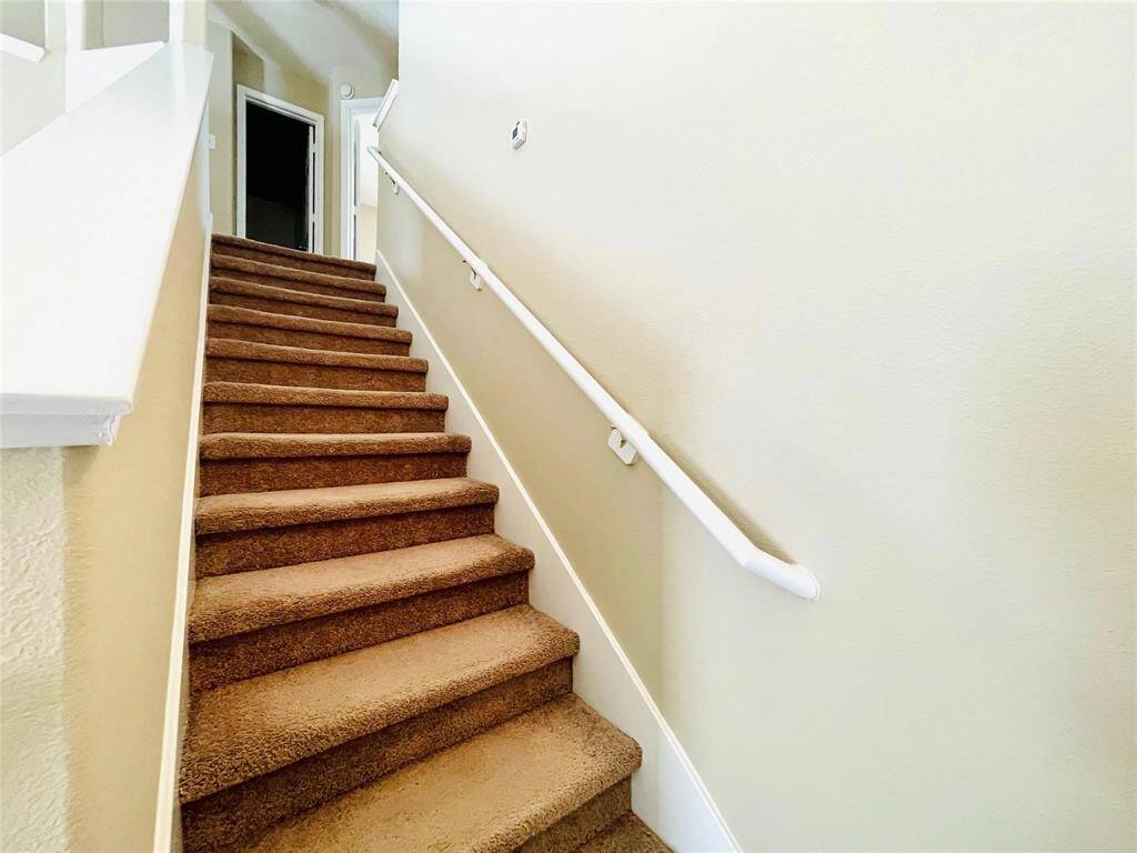Two large bedrooms, a bath andgame room upstairs.