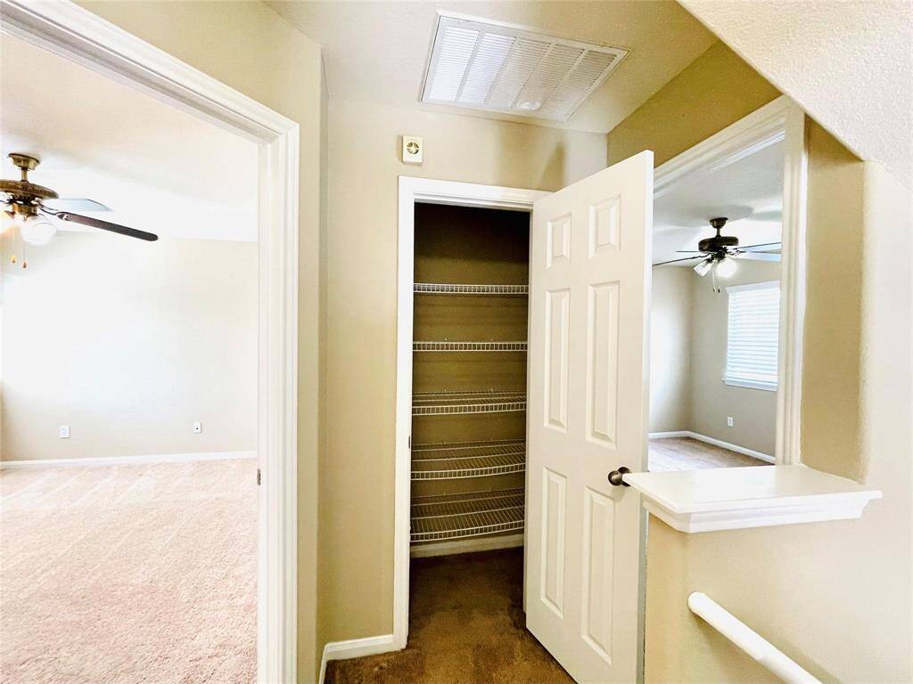 Extra storage between the twobedrooms.
