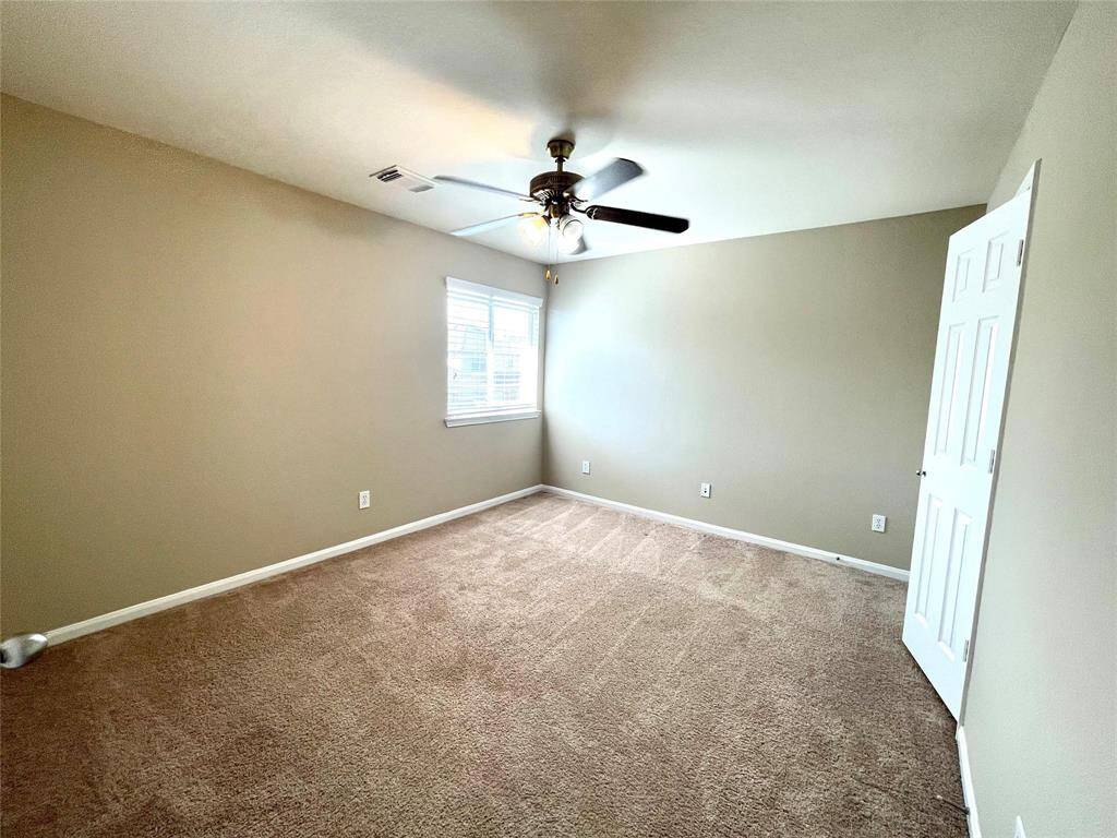 Secondary Bedroom #2 also withfan and closet.