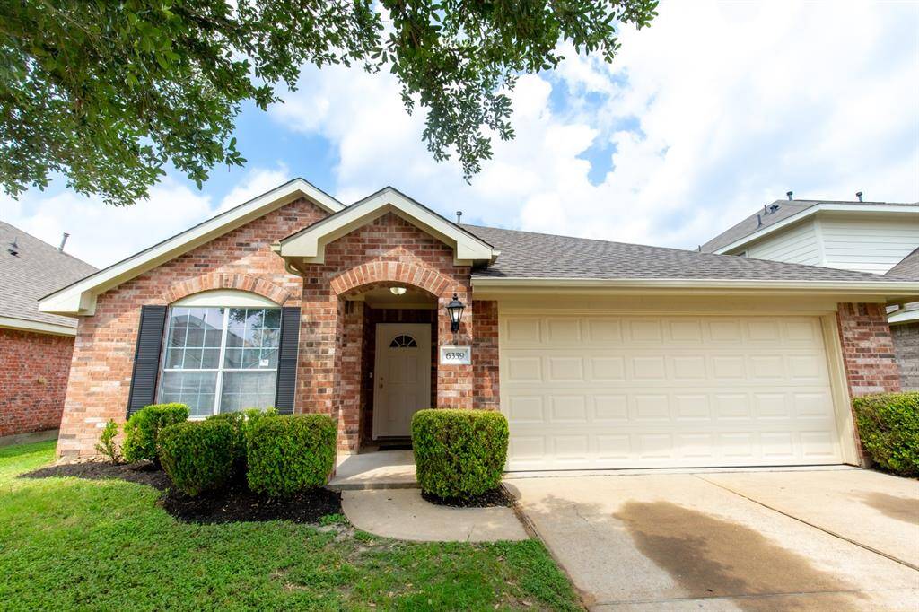 Charming single-story home with 4 sided brick exterior.