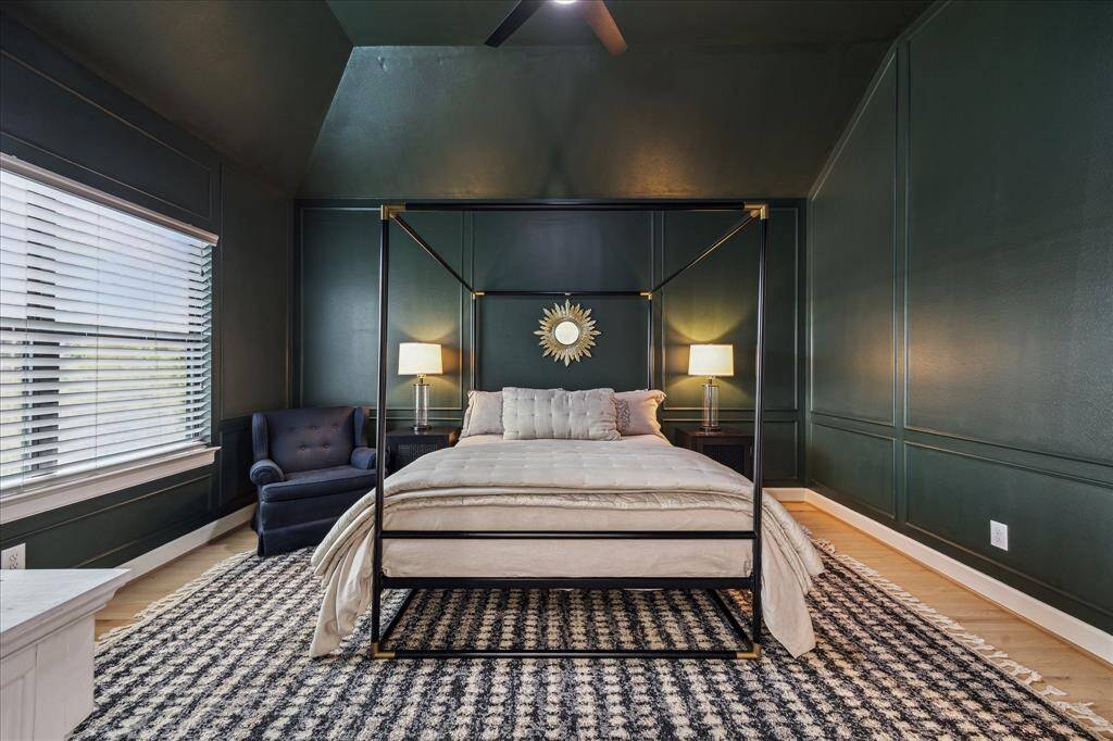 Primary bedroom with views to patio.