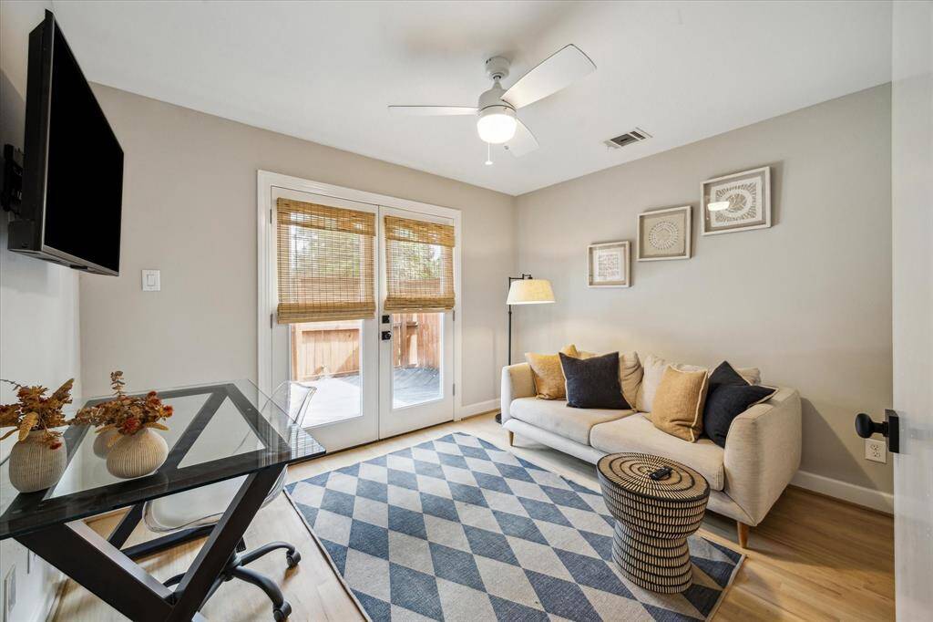 Bedroom #2 with French door access to the outdoor patio.