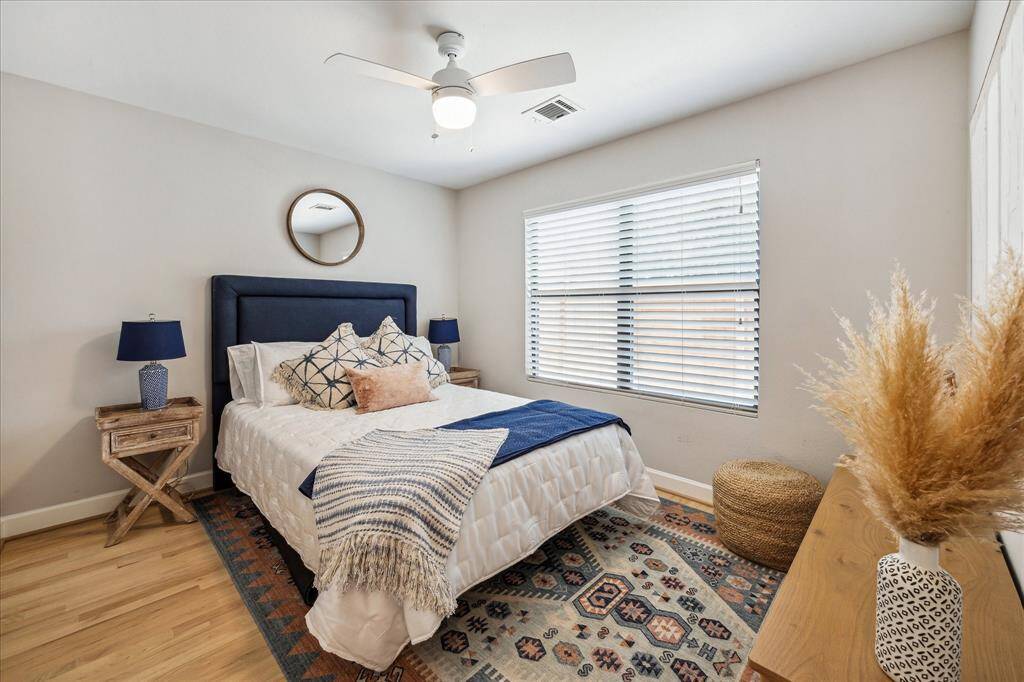 Bedroom #2 with views to back patio and walk in closet.