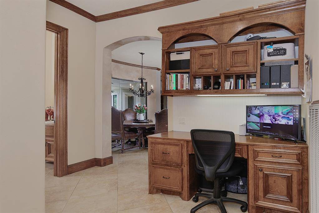 Convenient home organization hub with built-in desk off the kitchen
