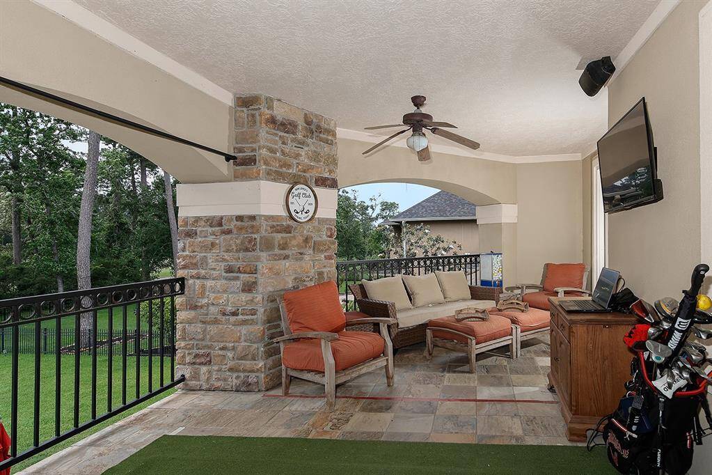 Expansive balcony with sweeping golf course views and tv mount