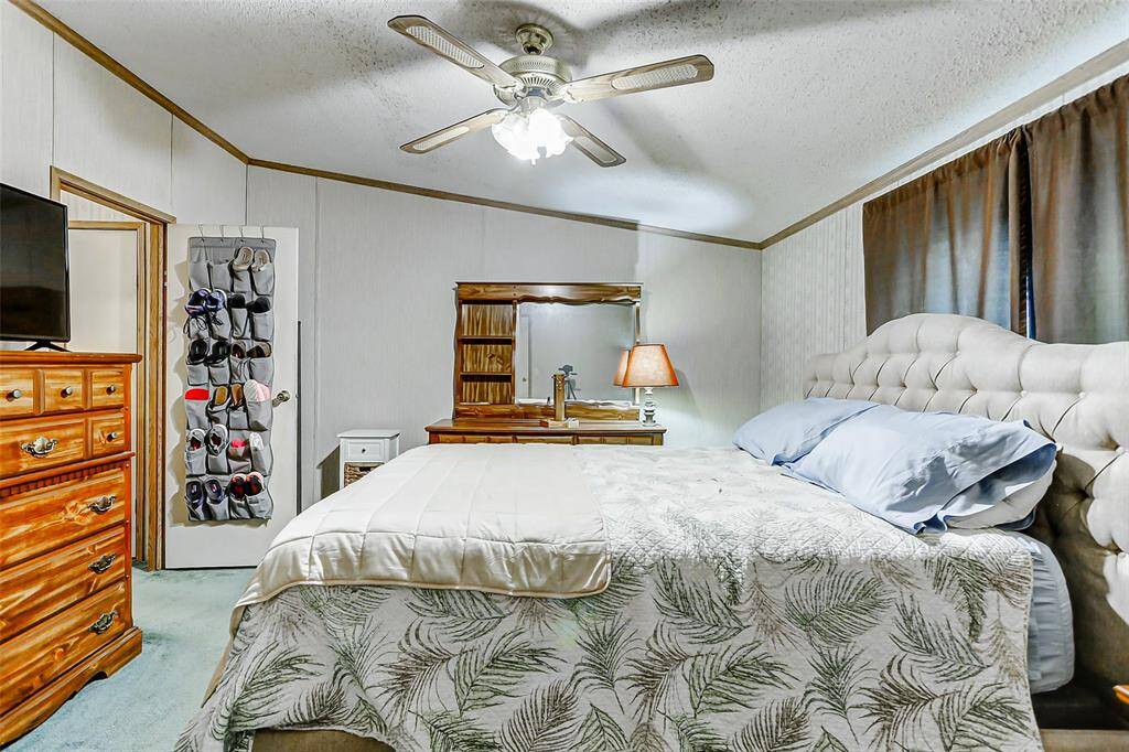 This primary bedroom is generous in size.