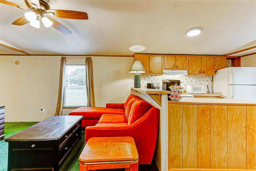 Natural light flows in through the window enhancing the warm atmosphere.