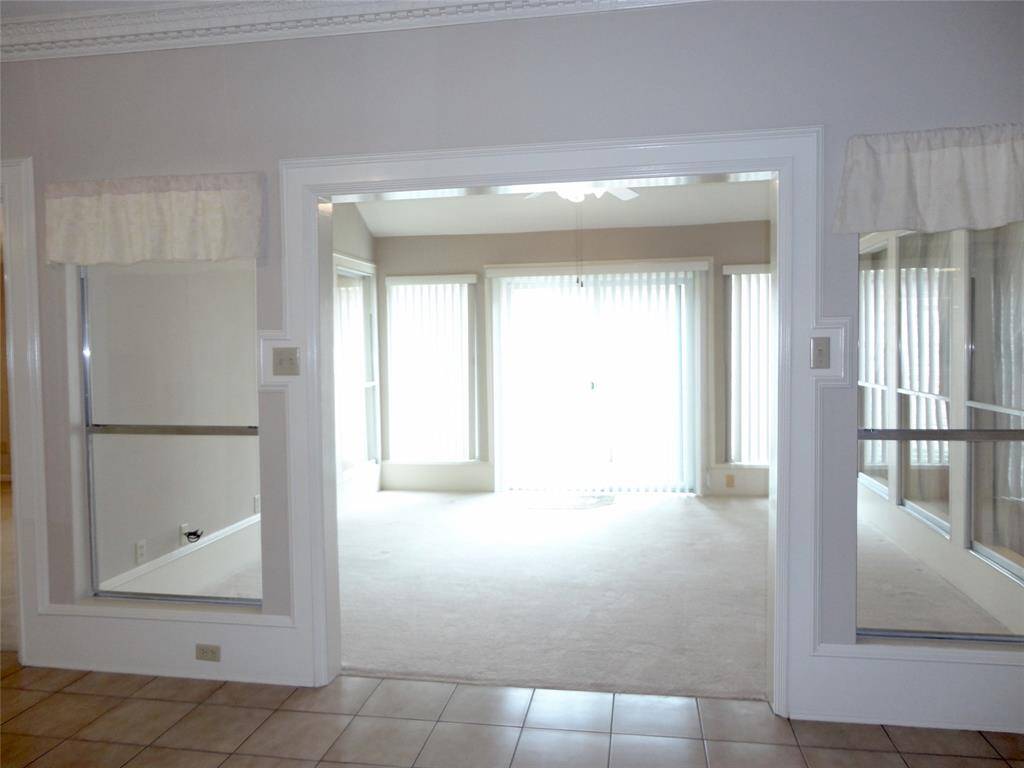 MULTI- PURPOSE ROOM.. COULD BE 'SUN ROOM'.. GAME ROOM.. DEN.. WORK-OUT?... BE CREATIVE...