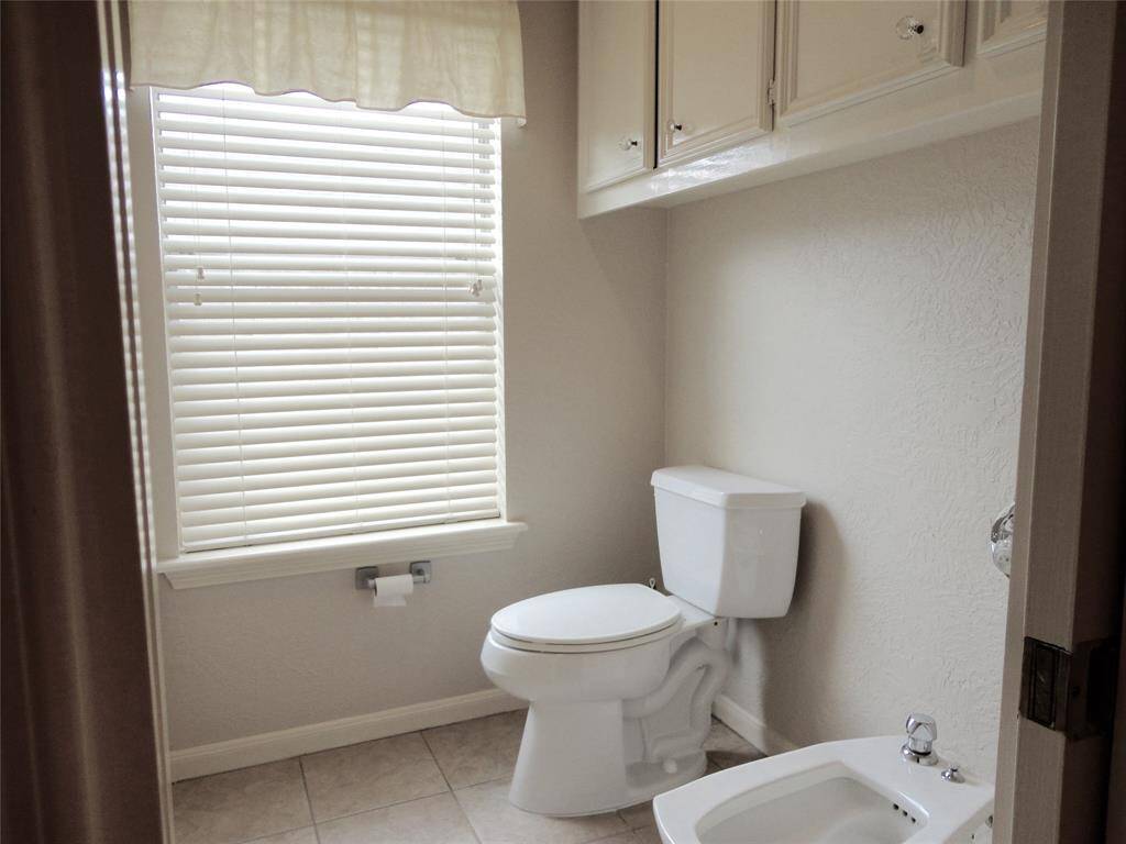 PRIVATE WATER CLOSET WITH DUAL FIXTURES...