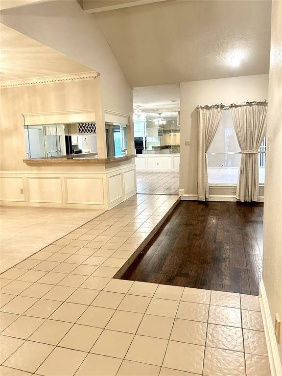ENTER THE TILED 11 X 8 ENTRY FOYER.. WITH VIEWS OF LIVING, DINING, BREAKFAST ... & SUN ROOM...