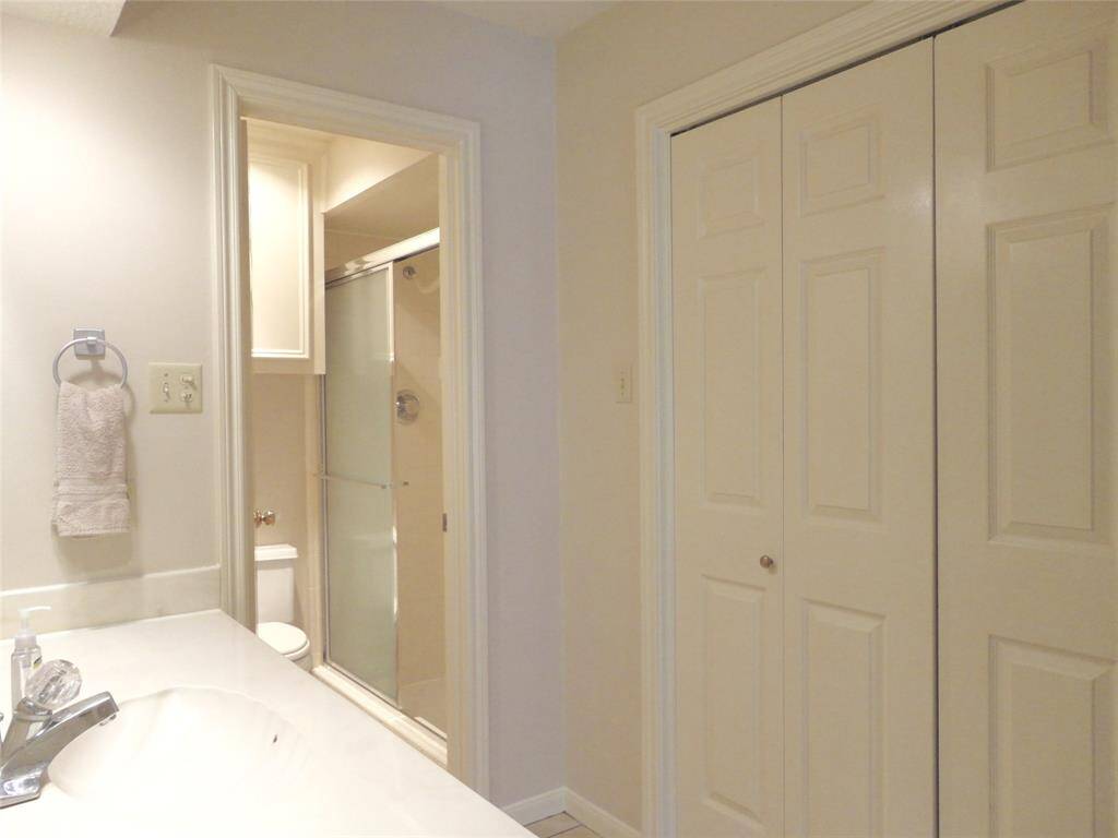 COMPARTMENT BATH... WITH SINK, DRESSING AREA, & CLOSETS... SPLIT FROM OVERSIZE WALK IN SHOWER & WATER CLOSET...