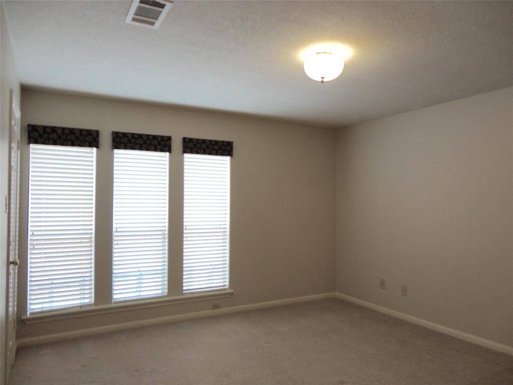FRONT BEDROOM... GREAT FOR STUDY OR PRIVATE GUEST SUITE...