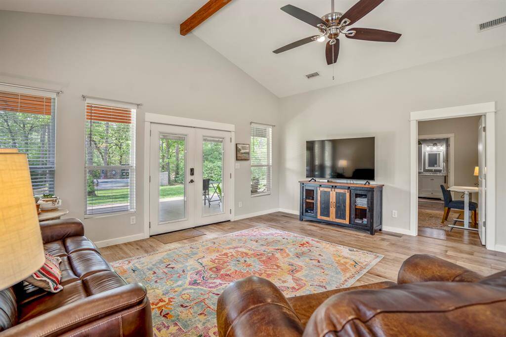 Neutral paint throughout and tall ceilings make this great room ideal for any homeowner.
