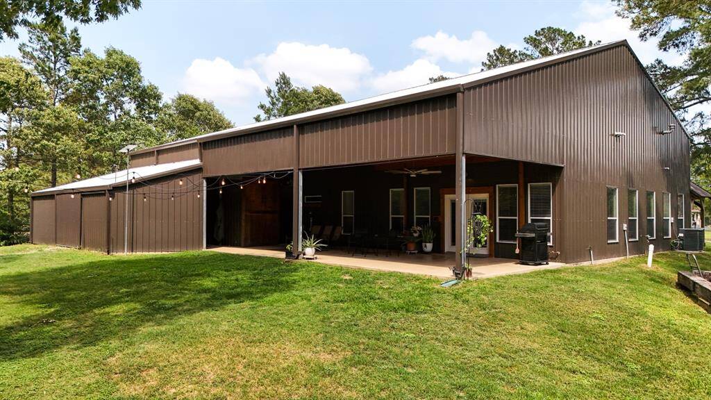 This outdoor space is perfect for entertaining!  Oversized back porch looks out over the entire back of the property.