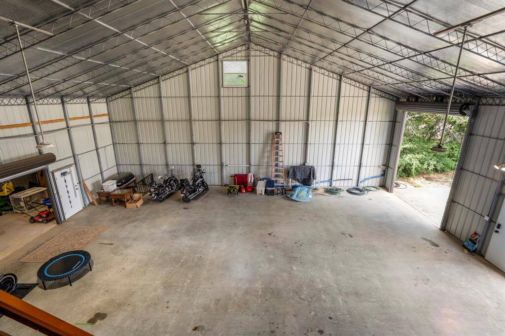 Imagine all the possibilities in this space!  Rolling garage doors, RV storage, and so much more!