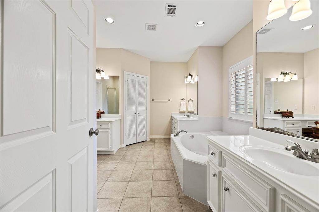 This elegantly designed space combines both functionality and style, transforming your daily routine into a spa-like experience.