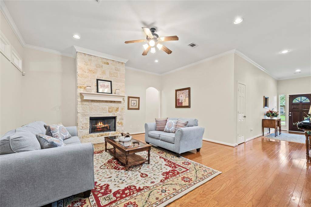 This generously sized room is further elevated by refined crown molding, adding a touch of timeless elegance to the space.