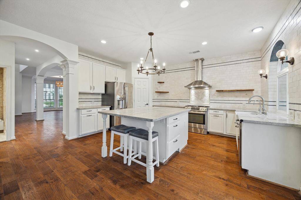 The kitchen seamlessly flows off the formal dining