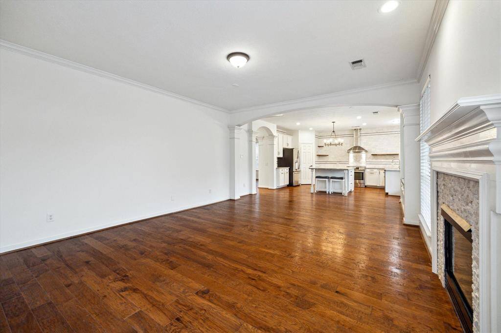Large informal Living room with a gas fireplace