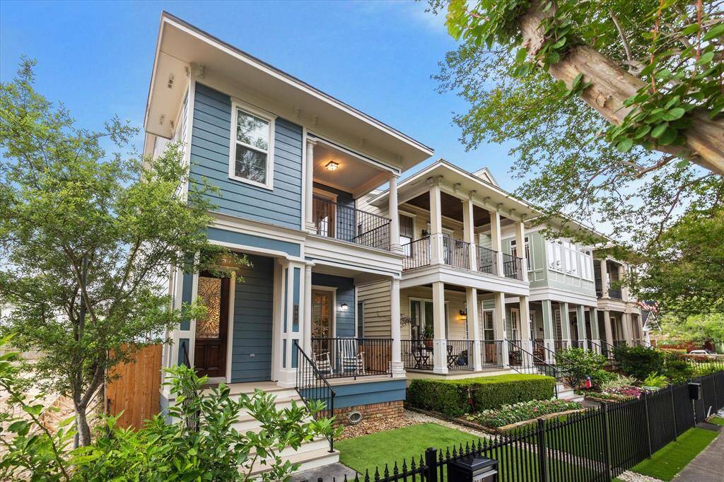 This home is part of an idyllic Heights streetscape.