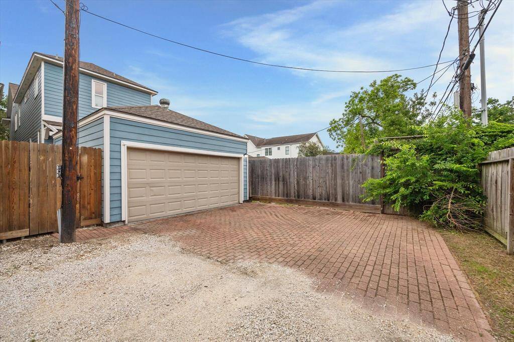 As alleyways go, this one is exceptional—paved and shared by only three other homes.