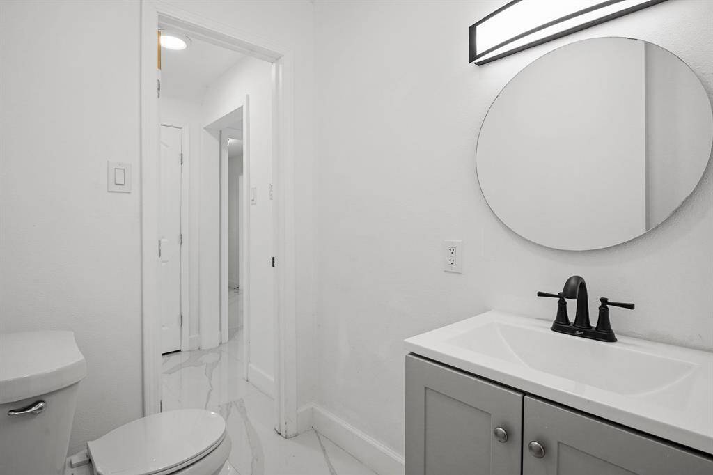 3rd full bathroom located downstairs with access from the pool area