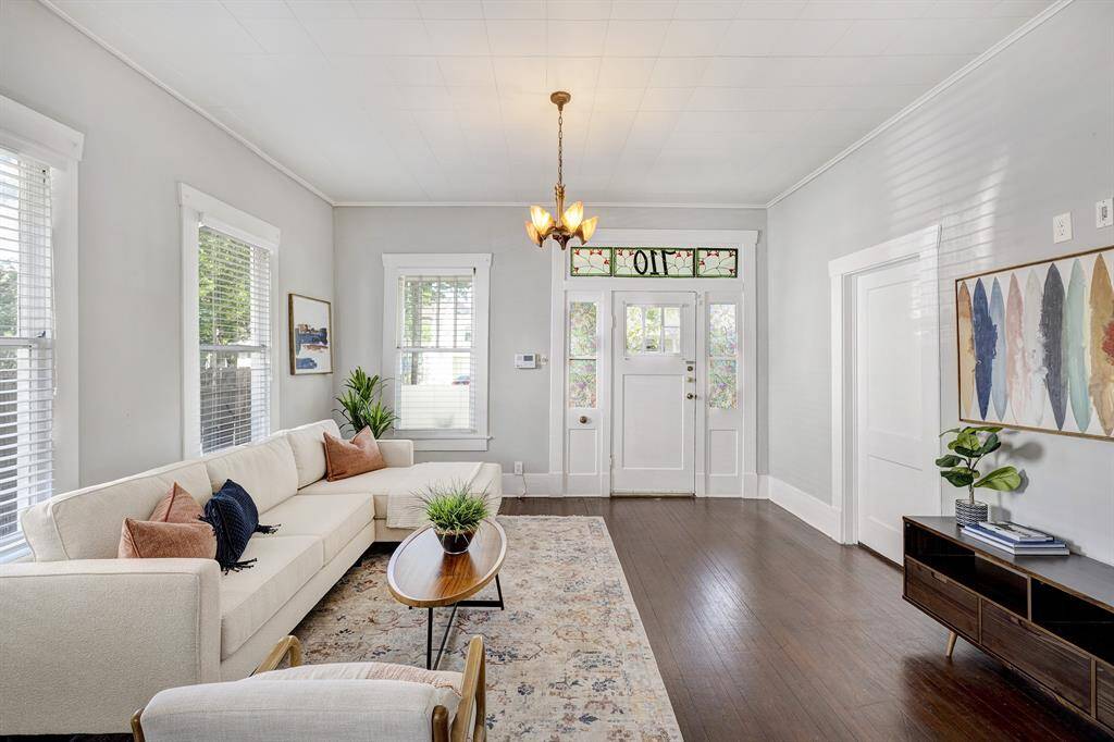 Front living room is a nice-size area to sit and enjoy everyday living with friends and family.